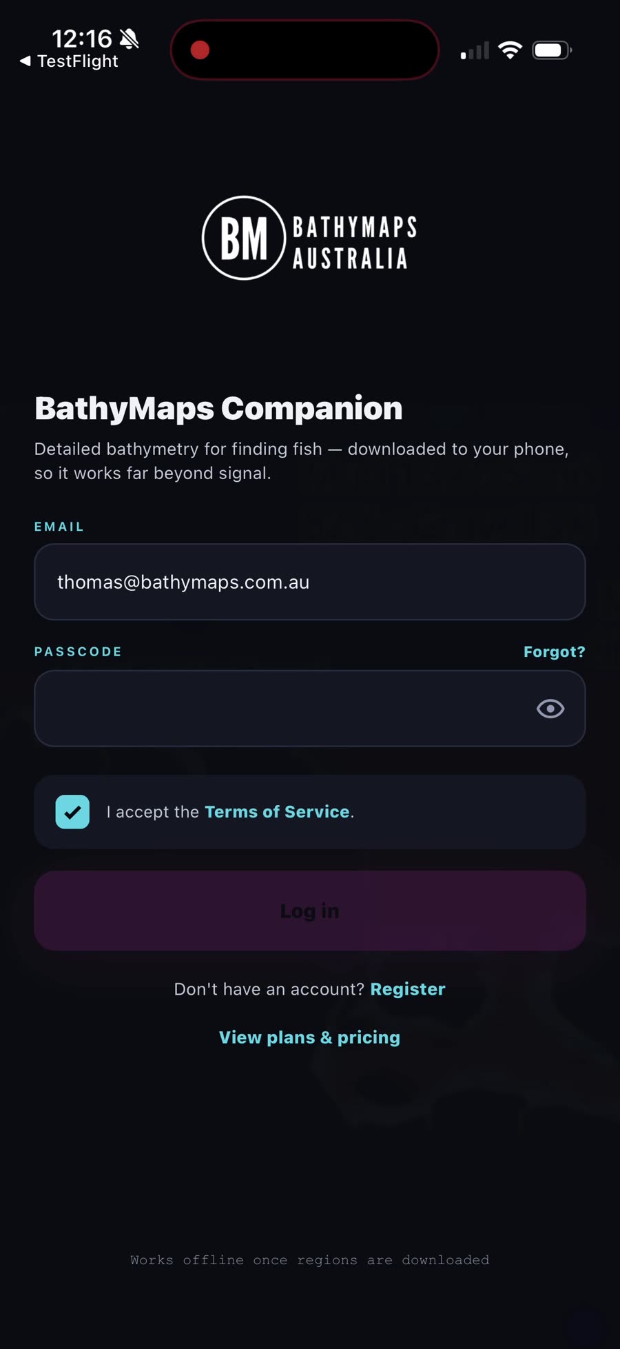 The BathyMaps Companion login screen with email and passcode filled in, Terms of Service accepted and the pink Log in button active
