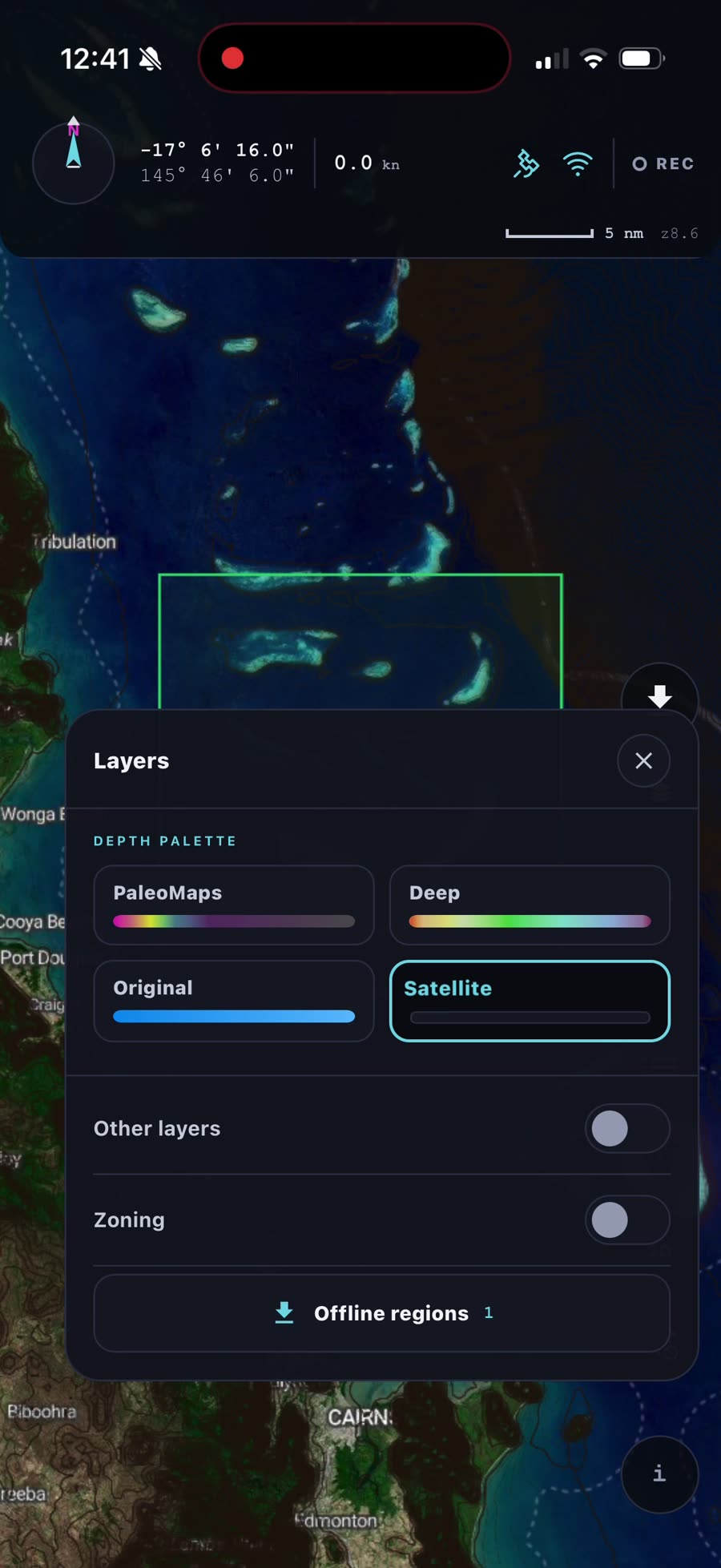The Layers panel with the Satellite palette selected and the downloaded imagery area outlined in green on the map
